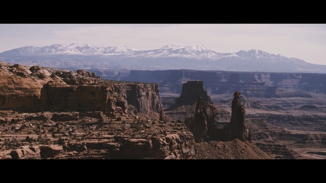 Video Reference N5: badlands, sky, rock, mountain, national park, escarpment, canyon, historic site, formation, terrain