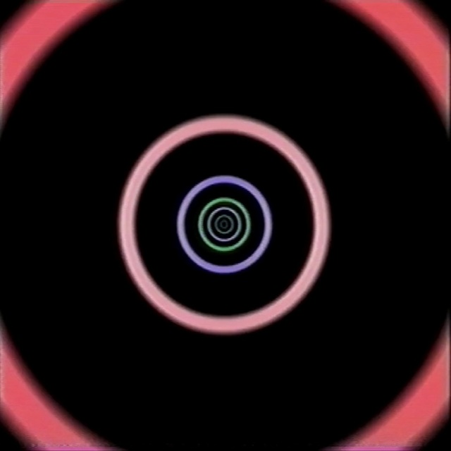 Video Reference N8: close up, circle, spiral, computer wallpaper, magenta, macro photography, compact disc, camera lens, graphics