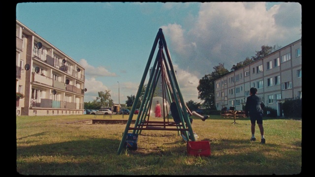 Video Reference N0: Playground, Public space, Outdoor play equipment, Tree, Human settlement, Swing, Pole, Sky, Urban area, Fun