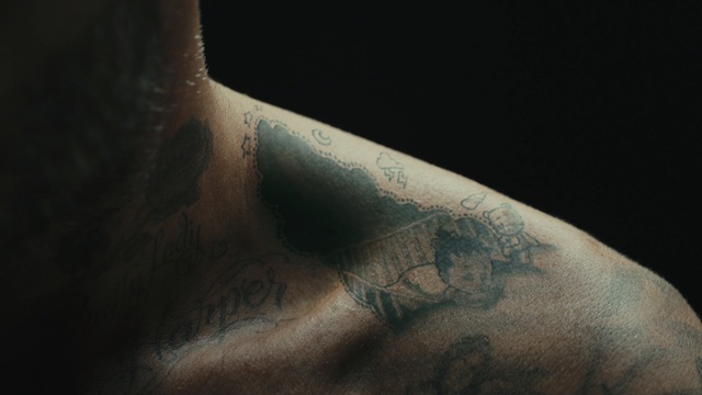 Video Reference N7: close up, photography, darkness, arm, facial hair, hand, macro photography, neck, flesh, chest