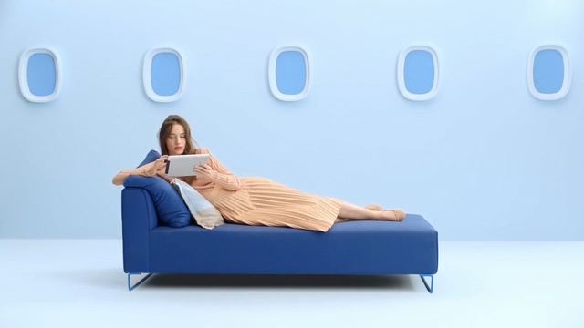 Video Reference N4: blue, furniture, couch, product, bed, sofa bed, product, comfort, chair, chaise longue, Person
