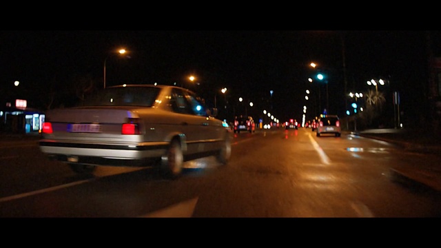 Video Reference N6: Vehicle, Night, Car, Lighting, Mode of transport, Snapshot, Street light, Midnight, Automotive lighting, Road