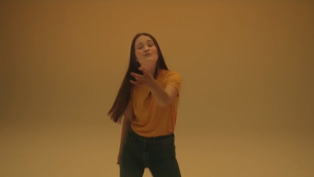 Video Reference N6: Shoulder, Standing, Arm, Yellow, Joint, Human body, Long hair, Fun, Gesture, Photography, Person