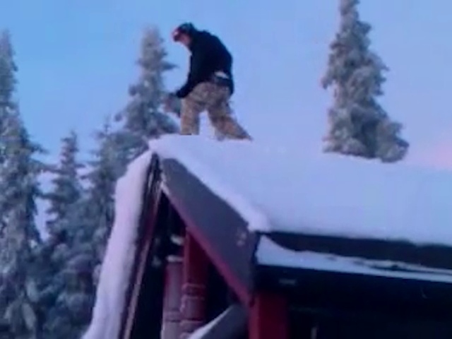 Video Reference N0: Snow, Roof, Winter, Freezing, Tree, Extreme sport, Ice, Fun, Recreation, Vehicle, Person, Outdoor, Jumping, Air, Man, Riding, Hill, Covered, Skiing, Flying, Red, Slope, Doing, Board, Trick, Truck, White, Standing, Mountain, Sky, Cold