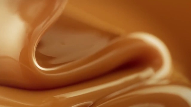 Video Reference N1: Orange, Dulce de leche, Close-up, Ear, Chocolate, Caramel color, Cream, Dairy, Food