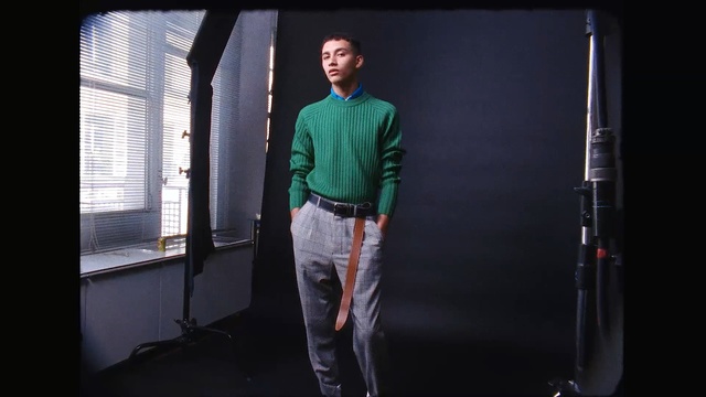 Video Reference N1: green, standing, fashion, t shirt, outerwear, gentleman, denim, jeans, performance, fashion design, Person