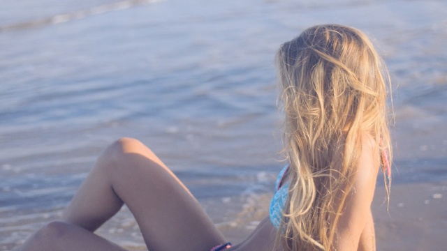 Video Reference N1: hair, sea, photograph, human hair color, blond, water, swimwear, girl, beauty, vacation