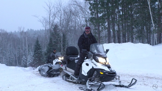 Video Reference N1: snowmobile, motor vehicle, snow, vehicle, winter, geological phenomenon, winter sport, freezing, ice, adventure, Person