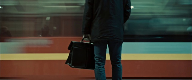 Video Reference N0: Black, Photograph, Jeans, Leather, Standing, Blue, Snapshot, Fashion, Baggage, Footwear, Person, Man, Front, Suit, Holding, Suitcase, Luggage, Walking, Woman, Television, Bus, Table, Screen, Yellow, Train, Room, Street, Board, Phone, Riding, Umbrella, Trousers, Luggage and bags, Jacket, Coat, Clothing, Handbag, Boot, Denim, Pocket, High heels