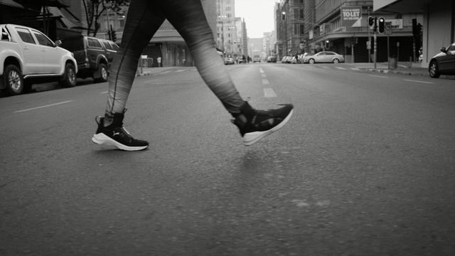 Video Reference N3: footwear, white, black, photograph, black and white, shoe, infrastructure, monochrome photography, road, leg, Person