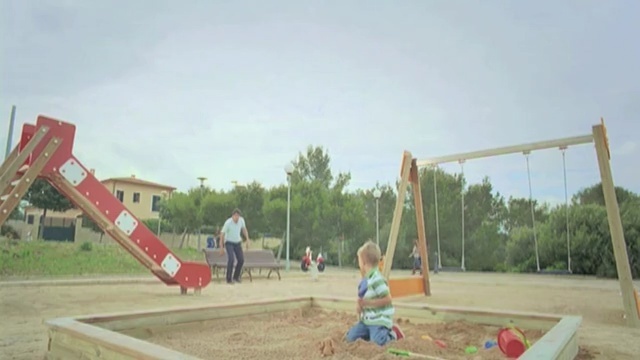 Video Reference N3: outdoor play equipment, playground, public space, leisure, recreation, swing, construction, play, playground slide, sports, Person