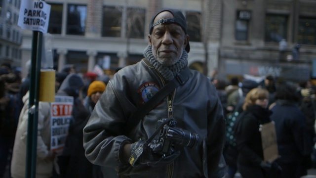 Video Reference N11: crowd, protest, street, event, demonstration, public event, riot, road, Person