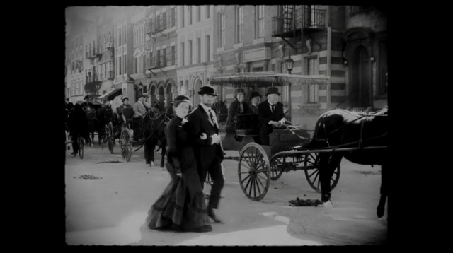 Video Reference N9: black, black and white, photograph, monochrome photography, carriage, mode of transport, photography, coachman, snapshot, street, Person