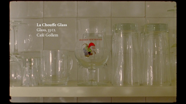 Video Reference N0: Glass, Drinkware, Transparent material, Plastic, Tableware, Stemware, Plastic bottle, Transparency, Person, Indoor, Water, Small, Sitting, Front, Woman, Holding, Man, Empty, Table, Glasses, Different, Filled, White, Young, Girl, Standing, Clear, Pink, Sink, Group, Wall, Vase, Bottle, Aquarium, Text, Fluid, Soft drink, Colored