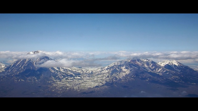 Video Reference N0: sky, mountainous landforms, mountain range, mountain, ridge, mount scenery, massif, atmosphere, cloud, highland