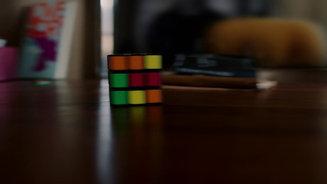 Video Reference N0: Rubiks cube, Puzzle, Toy, Light, Mechanical puzzle, Flooring, Colorfulness, Tints and shades, Floor