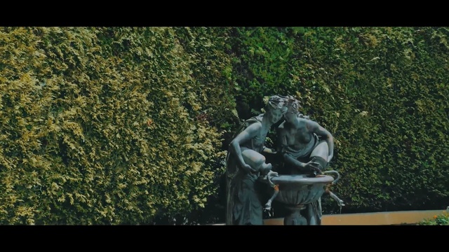 Video Reference N1: tree, green, statue, woody plant, grass, plant, screenshot, monument, sculpture, jungle