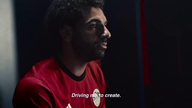 Video Reference N2: Red, Chin, Facial hair, Forehead, Football player, Music, Darkness, Photography, Beard, T-shirt