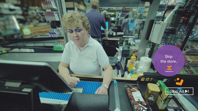 Video Reference N0: Snapshot, Customer, Electronics, Shopkeeper, Smile, Convenience store, Person, Indoor, Sitting, Table, Woman, Laptop, Man, Computer, Food, Front, Young, Office, Using, Store, People, Holding, Desk, Library, Eating, Standing, Kitchen, Text, Clothing