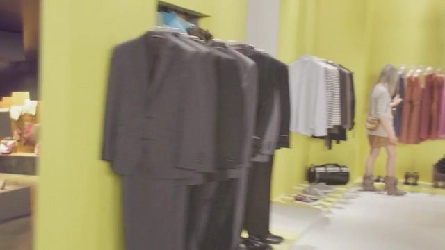 Video Reference N2: clothes hanger, boutique, suit, outerwear, shoulder, dress, formal wear, fashion, product, fashion design