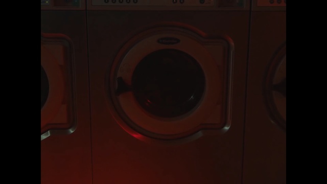 Video Reference N2: washing machine, red, major appliance, home appliance, clothes dryer, audio, loudspeaker, audio equipment, circle, screenshot
