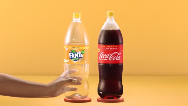Video Reference N3: product, drink, bottle, soft drink, coca cola, carbonated soft drinks, glass bottle, cola, plastic bottle, product, Person