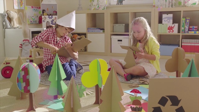 Video Reference N4: Play, Room, Cardboard, Kindergarten, Paper product, Child, Toddler, Art, Person
