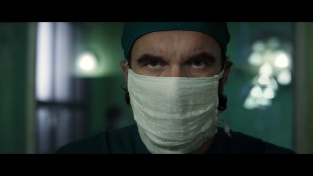 Video Reference N5: Face, Head, Forehead, Headgear, Mouth, Facial hair, Surgeon, Jaw, Photography, Personal protective equipment, Person