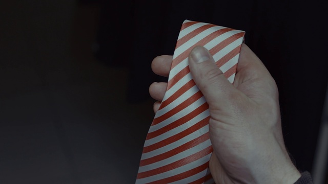 Video Reference N1: Hand, Finger, Flag, Tie, Gesture, Thumb, Flag of the united states, Paper