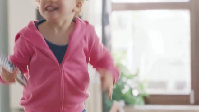 Video Reference N1: Pink, Clothing, Outerwear, Product, Shoulder, Sleeve, Child, Skin, Sweater, Standing