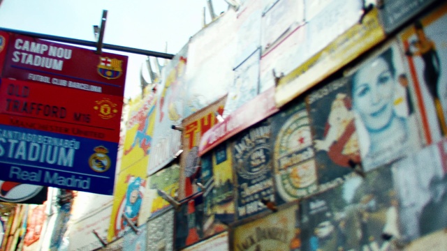 Video Reference N4: Wall, Advertising, Neighbourhood, Street, Building, Mural, Art, City, Signage