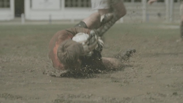 Video Reference N2: mud, soil, grass, traditional sport, material, player