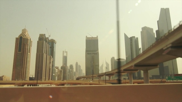 Video Reference N0: metropolitan area, skyscraper, skyline, metropolis, urban area, city, cityscape, building, tower block, haze, Person