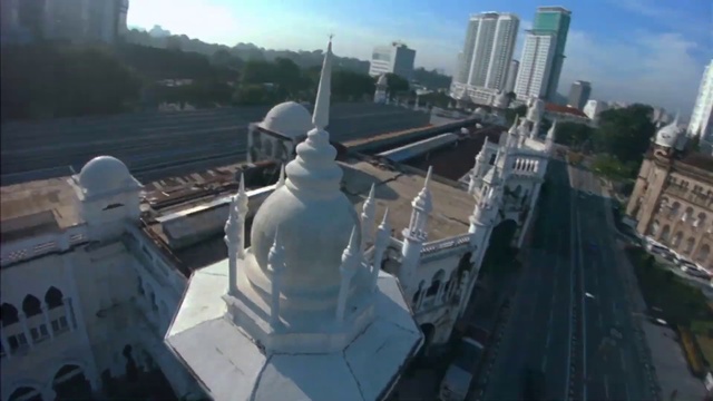 Video Reference N0: Landmark, Roof, Architecture, City, Metropolis, Metropolitan area, Tourist attraction, Vehicle, Aerial photography, Skyscraper