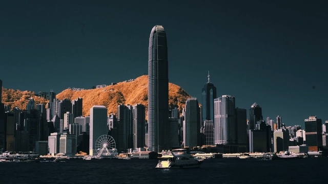 Video Reference N1: skyscraper, city, skyline, metropolis, metropolitan area, cityscape, landmark, tower, urban area, reflection