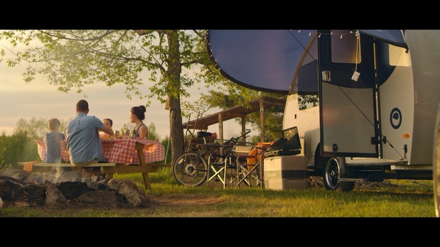Video Reference N5: Vehicle, Grass, Auto part, Recreation, Car, Camping, Style, Travel trailer, Person