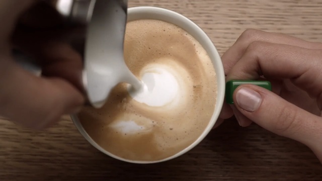 Video Reference N6: coffee, cappuccino, latte, espresso, cup, caffè macchiato, drink, coffee milk, cup, flat white, Person