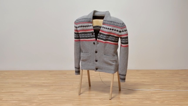 Video Reference N4: Clothing, Outerwear, Sweater, Woolen, Cardigan, Wool, Sleeve, Beige, Jacket, Pattern, Person