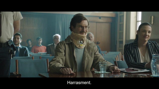 Video Reference N1: Conversation, Adaptation, Screenshot, Event, Photo caption, Job, Person, Indoor, Man, Table, Window, Sitting, Wine, Looking, Front, Glasses, Woman, People, Standing, Food, Counter, Glass, Holding, Group, Room, Kitchen, Human face, Text, Clothing