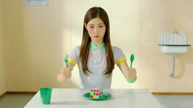 Video Reference N6: green, arm, girl, table, neck, Person