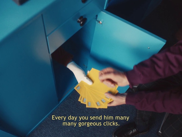 Video Reference N1: Yellow, Turquoise, Hand, Finger, Room, Table, Paper, Gesture