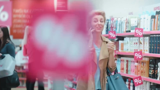 Video Reference N1: Pink, Snapshot, Magenta, Blond, Mouth, Selfie, Smile, Chest, Thumb, Person, Holding, Woman, Man, Girl, Front, Standing, Young, Store, Table, Wearing, Little, Walking, Umbrella, Sign, Large, Hat, Street, Red, Display, People, Phone, City, White, Riding, Clothing, Human face, Text