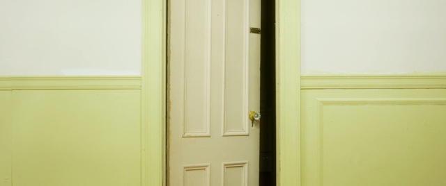 Video Reference N2: yellow, property, room, wall, wood, door, wood stain, paint, home, house