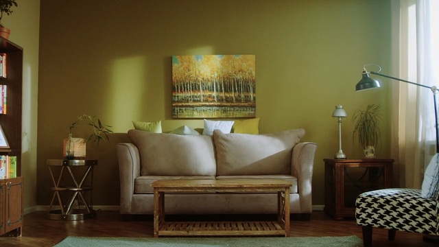 Video Reference N1: living room, furniture, room, home, interior design, couch, wall, chair, table, window