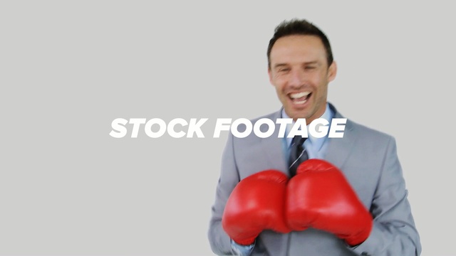 Video Reference N1: boxing equipment, shoulder, product, boxing glove, arm, sports equipment, neck, aggression, Person