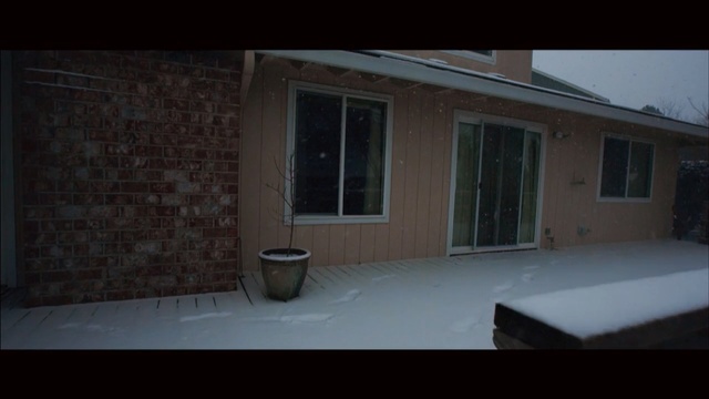 Video Reference N5: snow, home, property, house, residential area, window, winter, architecture, siding, wall