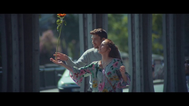 Video Reference N0: Snapshot, Human, Adaptation, Photography, Fun, Plant, Screenshot, Window, Scene, Movie, Person, Woman, Girl, Holding, Looking, Man, Standing, Front, Young, Phone, Table, Cake, Little, Pink, City, Umbrella, Street, Playing, Room, Clothing, Human face, Flower