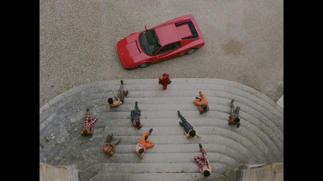 Video Reference N1: car, red car, people, street, top shot, stairs , Person