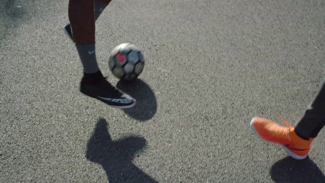 Video Reference N8: Soccer ball, Football, Freestyle football, Ball, Shadow, Footwear, Asphalt, Street football, Sports, Shoe, Person