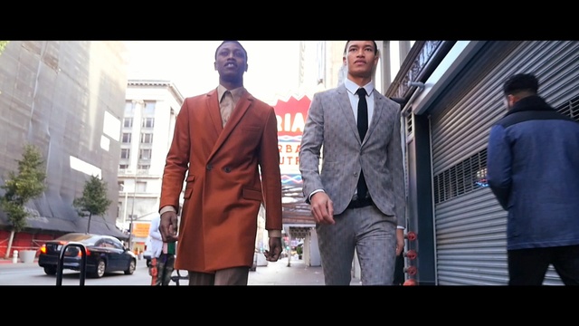 Video Reference N0: suit, gentleman, outerwear, street, vehicle, car, Person